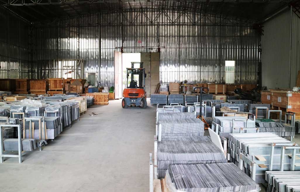 silicon carbide kiln shelves and rollers stored and organized in warehouse during logistics preparation stage